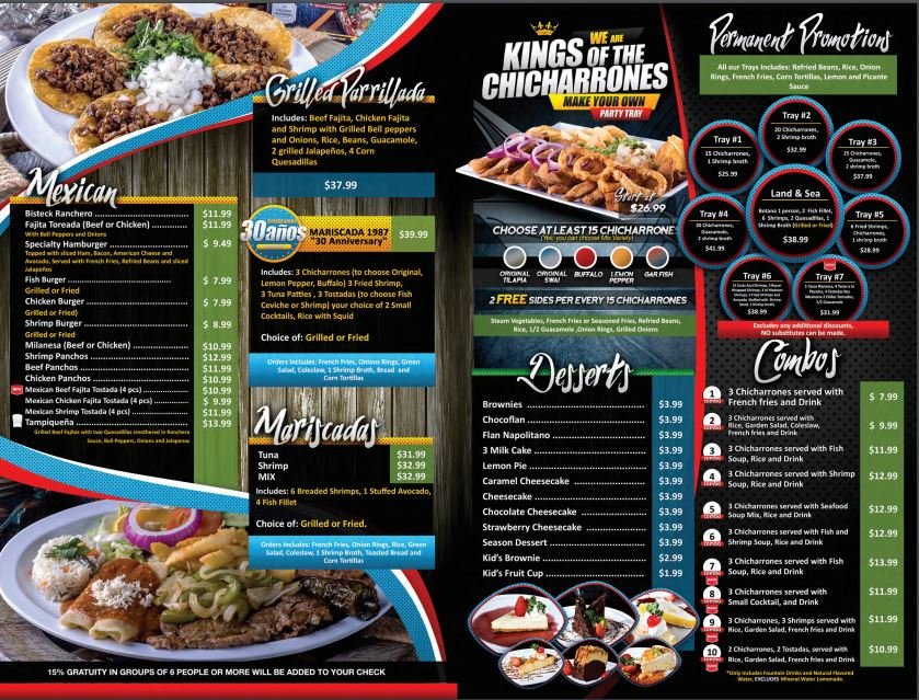 Restaurant menu laid out on a table.